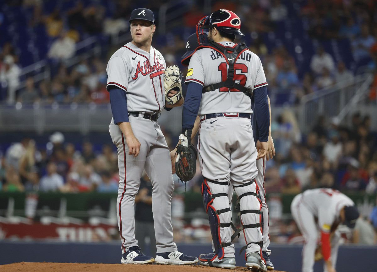 Sep 15, 2023; Miami, Florida, USA; Atlanta Braves starting pitcher Bryce Elder (55) and catcher Travis d'Arnaud (16) stand on the mound between batters against the Miami Marlins during the first inning at loanDepot Park.